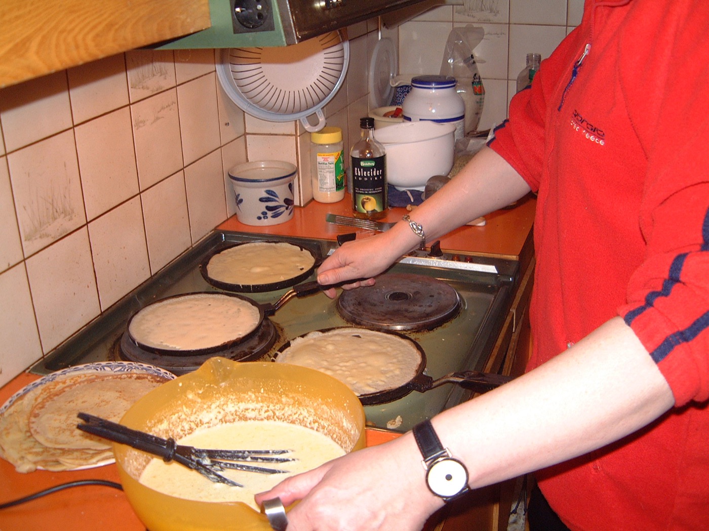 Thin Icelandic pancakes cooking in a frying pan